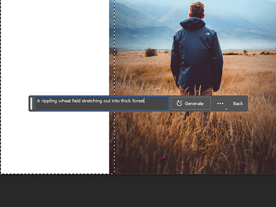 Using the Generative Fill tool in Photoshop as an AI image extender, on a photo of a man in a blue jacket standing in a golden field looking at some blue foggy mountains in the distance.