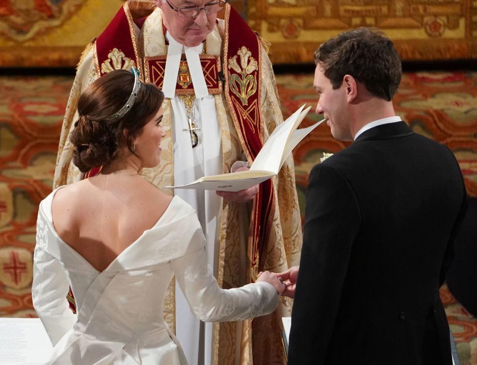 Exchanging vows.