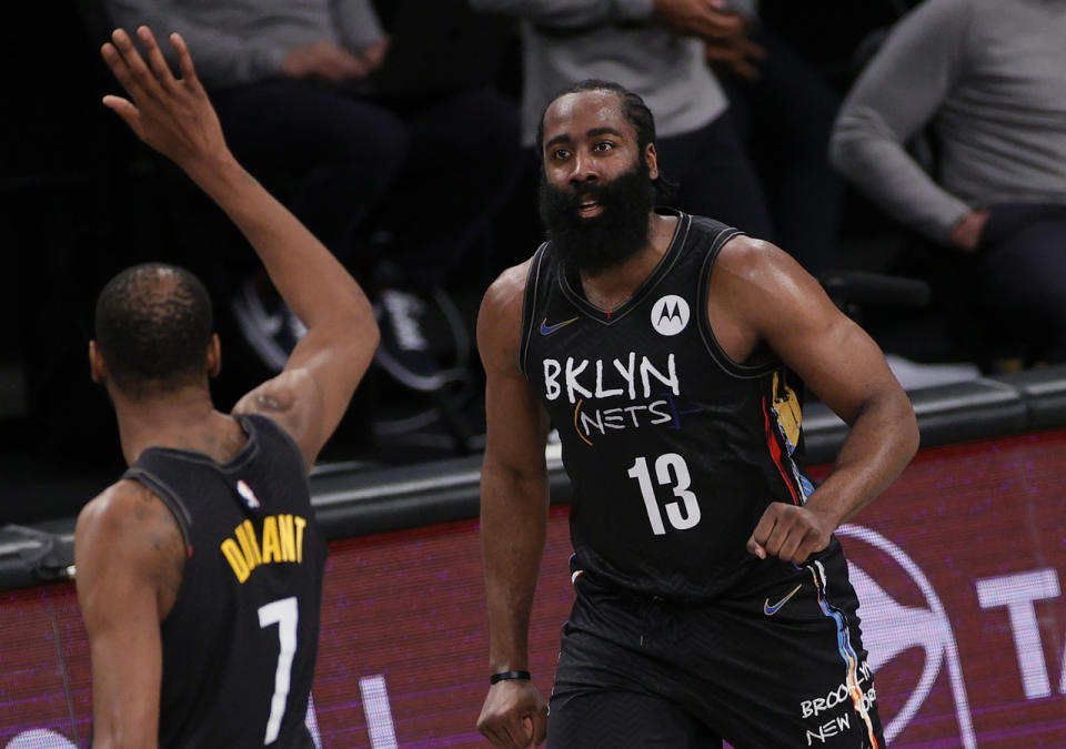 Kevin Durant greets James Harden