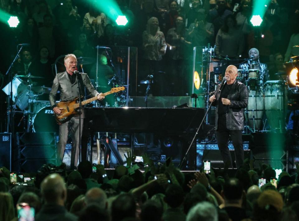 Sting joined Joel onstage, and Joel said Sting was one of his “real estate clients.” Getty Images