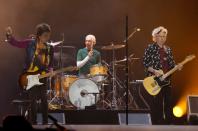 Keith Richards, Ronnie Wood and Charlie Watts of The Rolling Stones perform during their "Latin America Ole Tour" at the Foro Sol in Mexico City