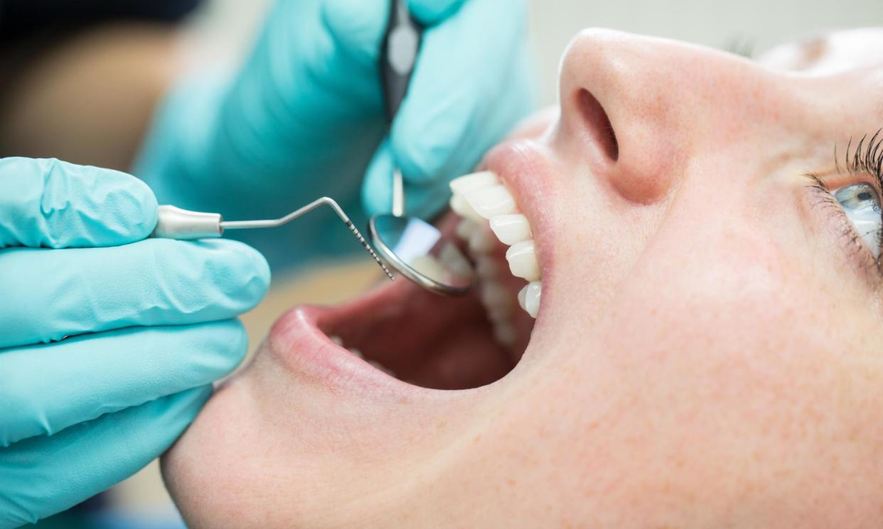 <span>Many of those at high-risk of infective endocarditis after a dental visit are young. </span><span>Photograph: Luis Alvarez/Getty Images</span>