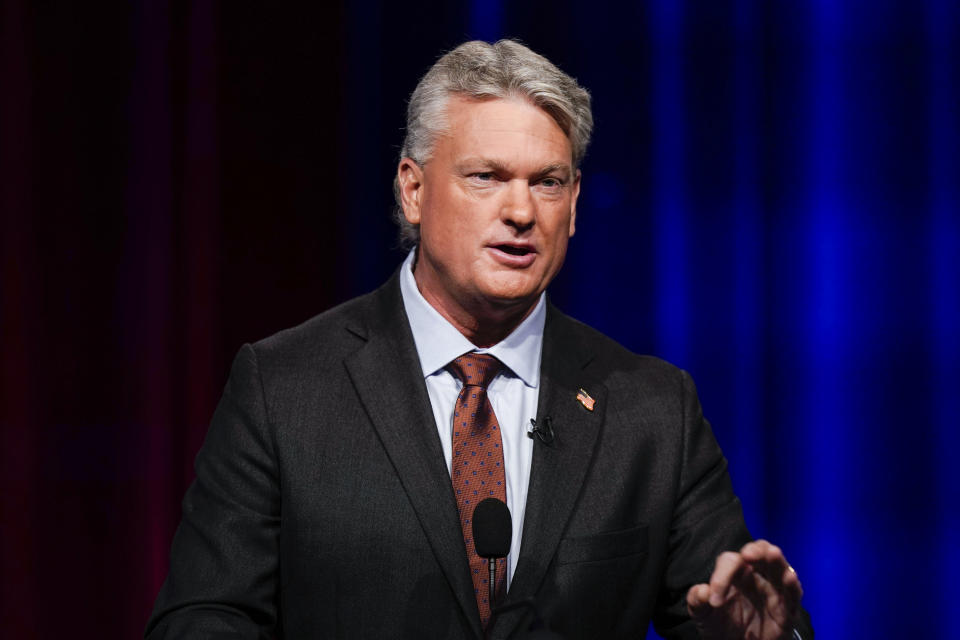 FILE - Mike Collins participates in a Republican primary debate for Georgia's 10th Congressional District, June 6, 2022, in Atlanta. Collins, who won a U.S. House seat in 2022, issued a statement Monday, May 6, 2024, saying that he stands by his admiration of college students who push back against those protesting the Israel-Hamas war, but he backtracked somewhat on his earlier praise of a counter-protest at the University of Mississippi that included a man appearing to make monkey noises and gestures at a Black woman. (AP Photo/Brynn Anderson, File)