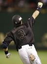 Japan's Nobuhiro Matsuda reacts after hitting his solo homer off U.S. Major League Baseball (MLB) All-Stars pitcher Tsuyoshi Wada of the Chicago Cubs pitches during the eighth inning of an exhibition baseball game in Tokyo November 14, 2014. REUTERS/Toru Hanai (JAPAN - Tags: SPORT BASEBALL)