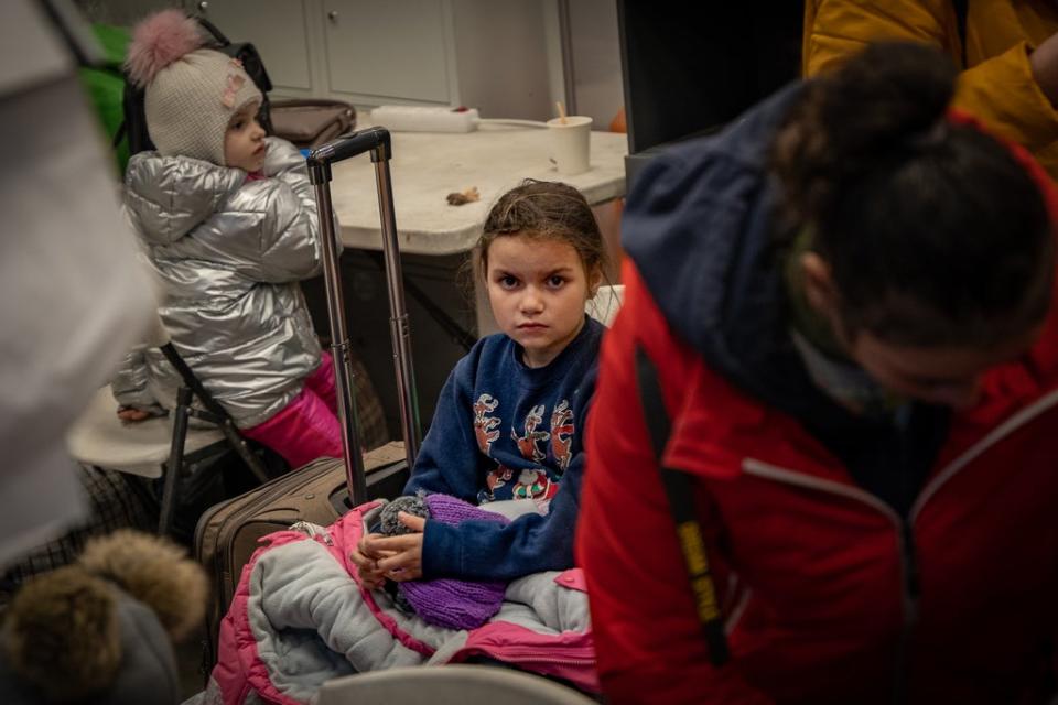 Children arrive at a reception centre in Zaporizhzhia in the middle of the night after a dangerous journey from Mariupol (Bel Trew)