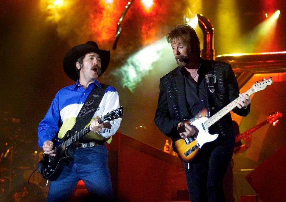 Kix Brooks (left) and Ronnie Dunn perform for a large crowd at the Celeste Center at the Ohio State Fair.