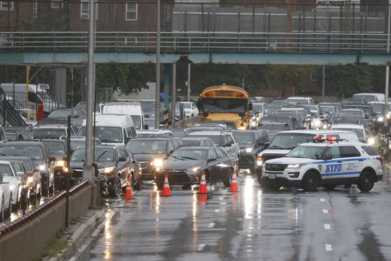 Police close off the FDR Drive at the Houston Street entrance due to heavy rains and flooding along the highway in Manhattan. Photo by John Angelillo/UPI