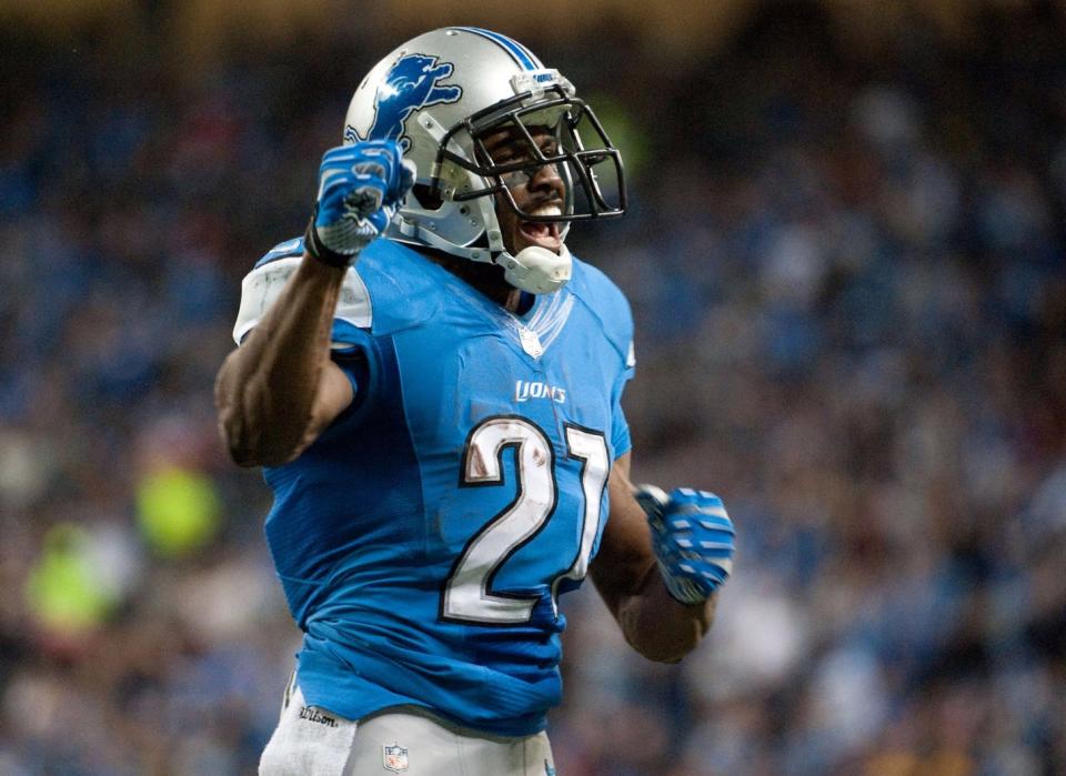 Nov 28, 2013; Detroit, MI, USA; Detroit Lions running back Reggie Bush (21) celebrates during the second quarter against the Green Bay Packers during a NFL football game on Thanksgiving at Ford Field. Mandatory Credit: Tim Fuller-USA TODAY Sports