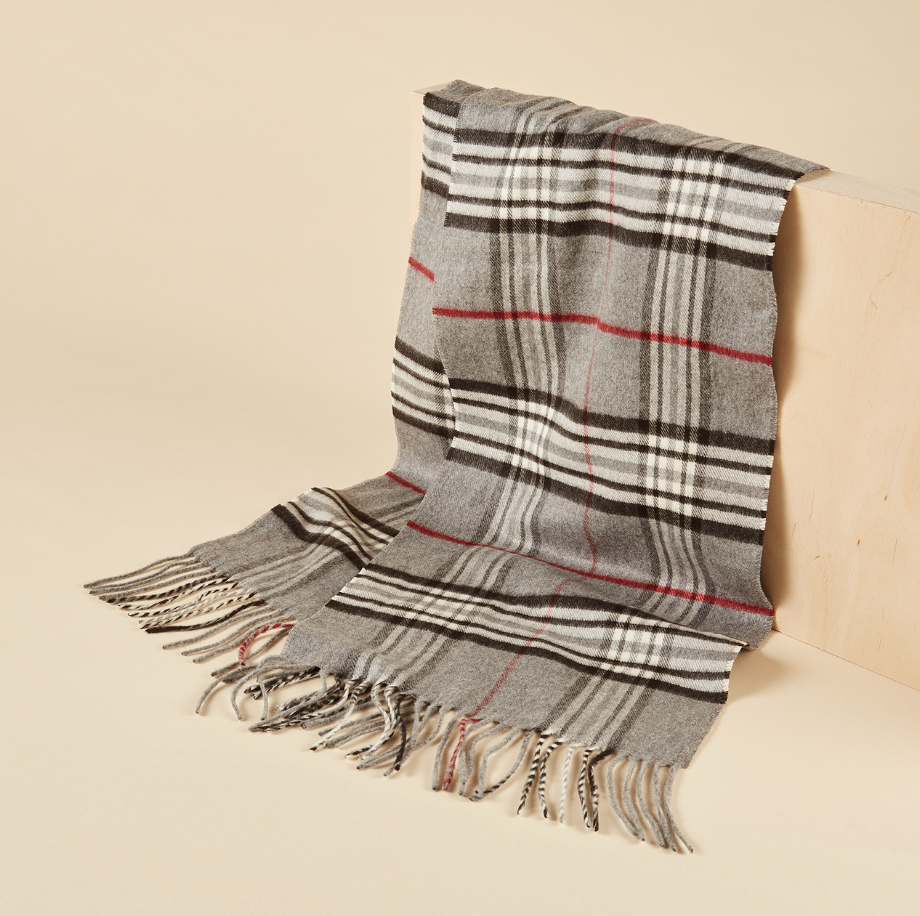 Plaid Cashmink Scarf in grey, black and white (Photo via Northern Reflections)