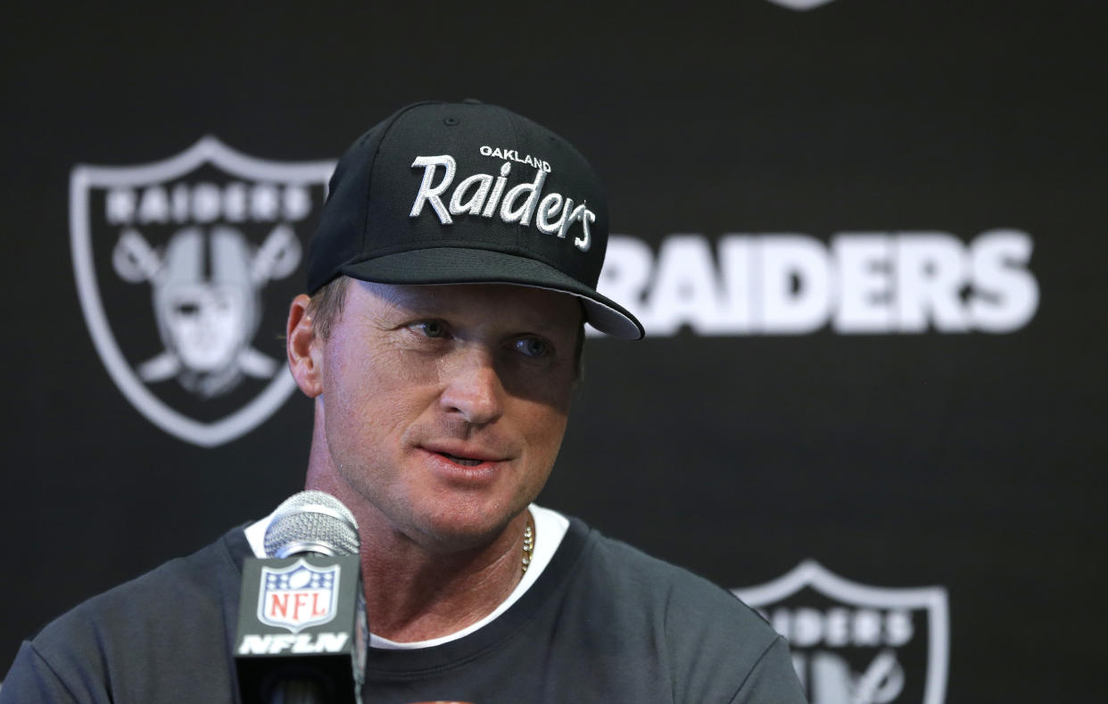 Oakland Raiders head coach Jon Gruden responds to a question at the NFL football team's mini-camp, Tuesday, June 12, 2018, in Alameda, Calif. Gruden coached the Raiders from 1998 through 2001before being traded to Tampa Bay. Gruden replaces Jack Del Rio who was fired at the end of last season. (AP Photo/Rich Pedroncelli)