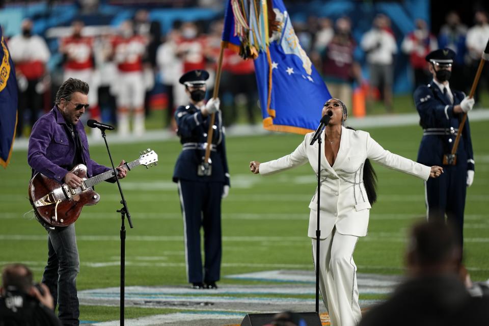 Eric Church and Jazmine Sullivan performs the national anthem before the NFL Super Bowl 55 football game between the Kansas City Chiefs and Tampa Bay Buccaneers, Sunday, Feb. 7, 2021, in Tampa, Fla. (AP Photo/David J. Phillip)