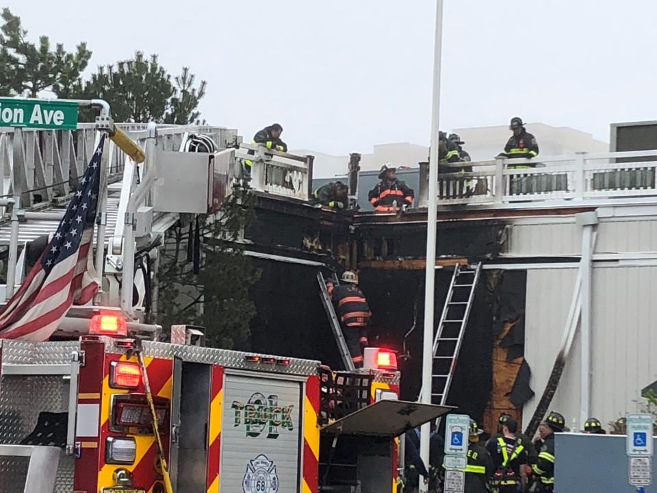 Firefighters in Long Branch put out a fire at Charley's Ocean Bar & Grill in Long Branch on Saturday, April 15, 2023.