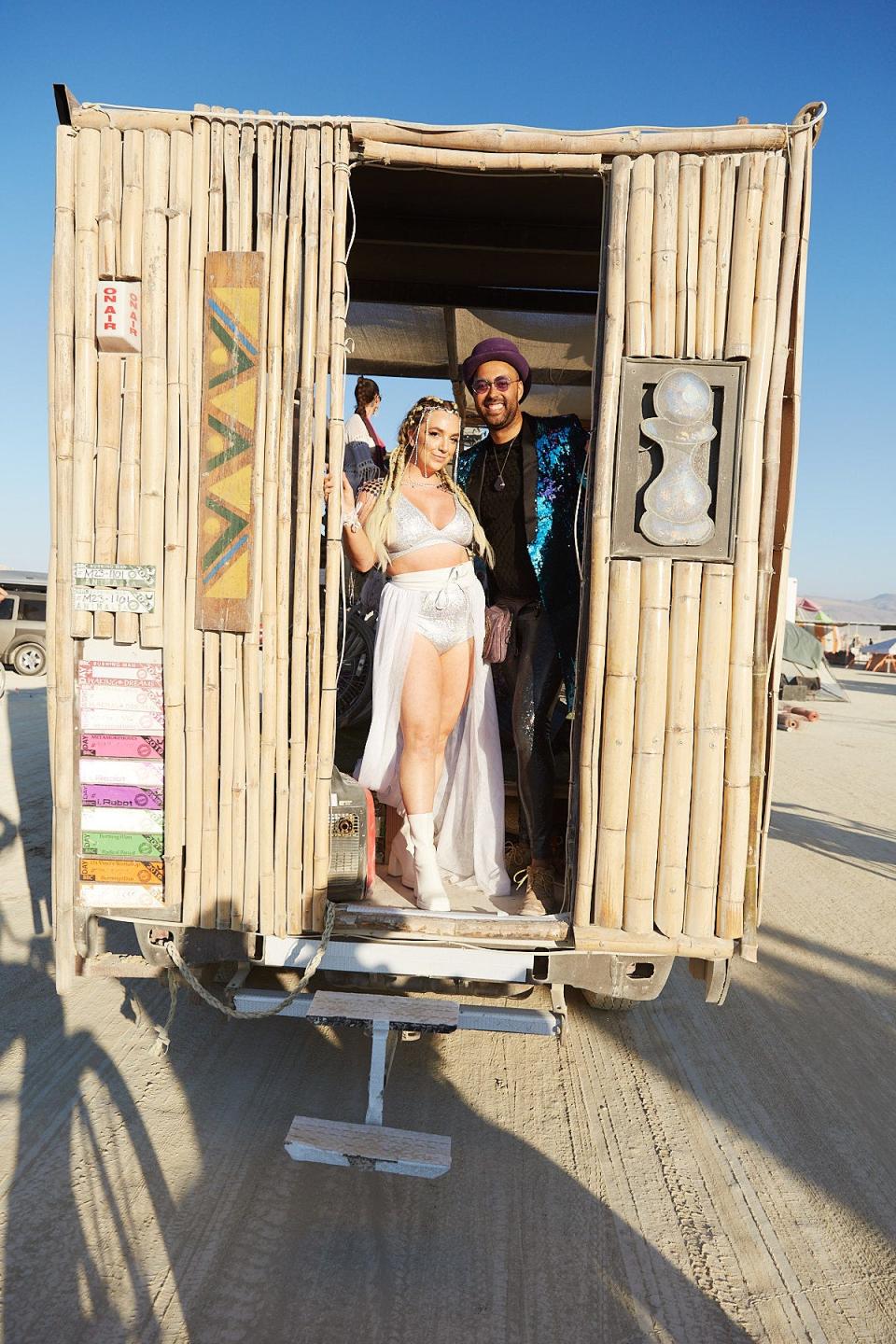 Ari and Chase on the art car at their Burning Man wedding