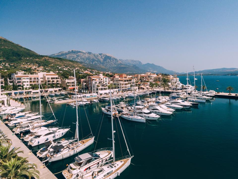 A row of yachts moored at Porto Montenegro.