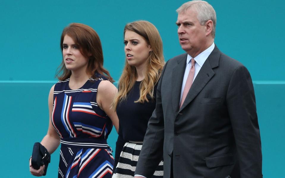 Prince Andrew's daughters are said to be shaken by their father's case - JUSTIN TALLIS/AFP