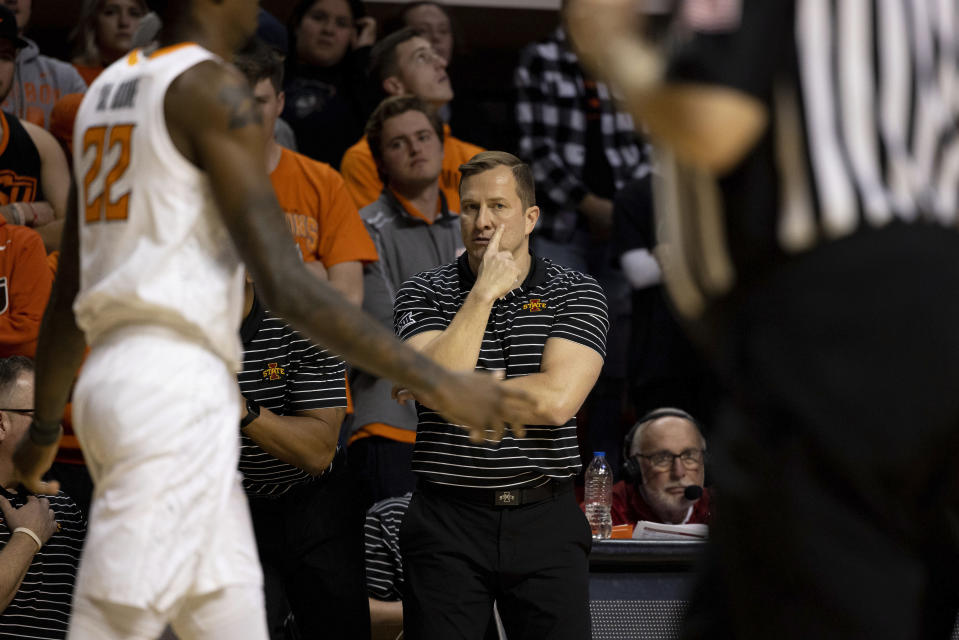 Iowa State head coach T.J. Otzelberger reacts from the baseline of the NCAA college basketball game against Oklahoma State in Stillwater, Okla., Saturday, Jan. 21, 2023. (AP Photo/Mitch Alcala)