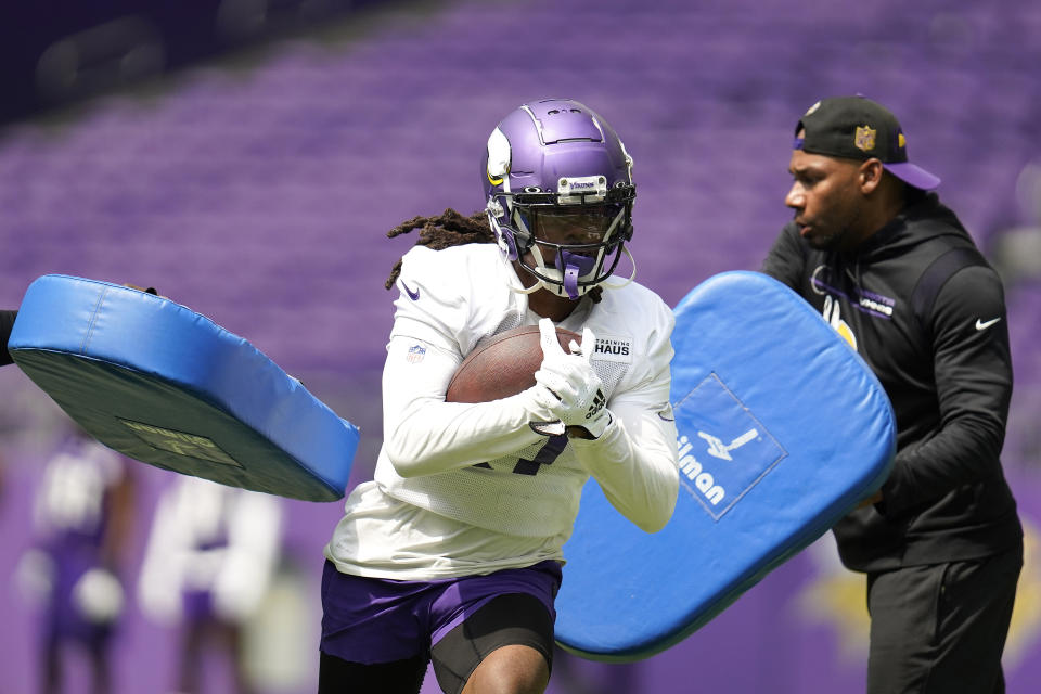 Minnesota Vikings wide receiver K.J. Osborn (17) takes part in drills during the NFL football team's training camp at US Bank Stadium in Minneapolis, Friday, July 29, 2022. (AP Photo/Abbie Parr)