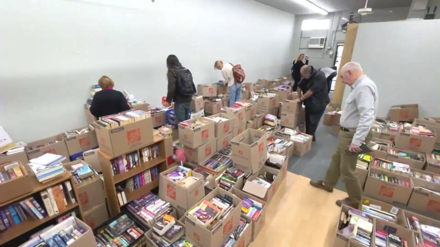 Customers shop a closeout sale at The Book Rack in Arcadia on Feb. 27, 2024. (KTLA)