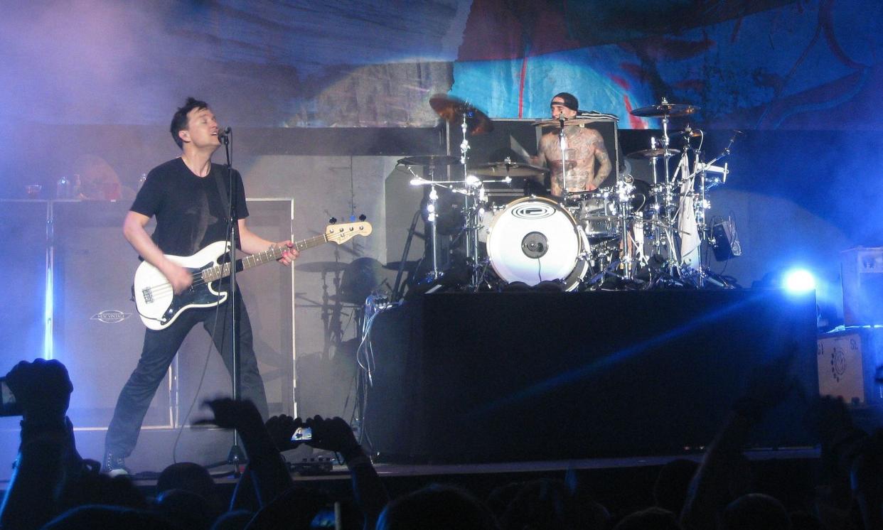 Blink-182 performing at the Valley View Casino Center in San Diego, California on December 11, 2011 as part of radio station 91X's "Wrex the Halls" concert. Left to right: singer/bassist Mark Hoppus and drummer Travis Barker.