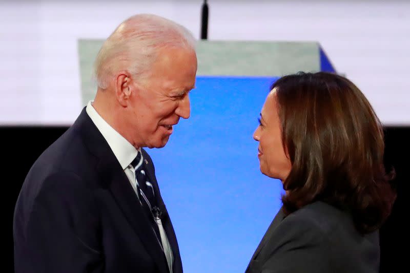 FILE PHOTO: Candidates former Vice President Joe Biden and U.S. Senator Kamala Harris take the stage on the second night of the second 2020 Democratic U.S. presidential debate in Detroit