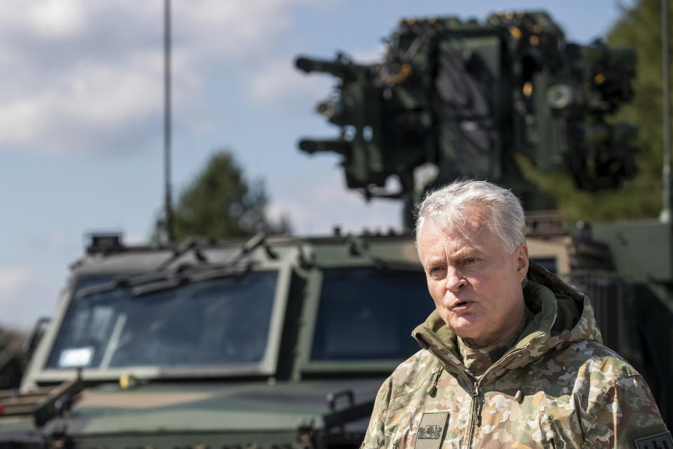 Lithuania's President Gitanas Nauseda speaks during a joint media conference with Poland's President Andrej Duda during the Lithuanian-Polish Brave Griffin 24/II military exercise near the Suwalki Gap close to the Polish border at the Dirmiskes village, Alytus district west of the capital Vilnius in Lithuania on Friday, April 26, 2024. The week-long military exercise which started April 22, is to test a defense scenario on the bilateral so-called “Orsha” plan to defend the Suwałki Gap, a corridor of almost 100 kilometers (62 miles) between the two NATO members Poland and Lithuania. (AP Photo/Mindaugas Kulbis)