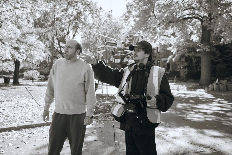 Kristoffer Borgli (right) directs Nicolas Cage in Dream Scenario. (A24/Courtesy Everett Collection)