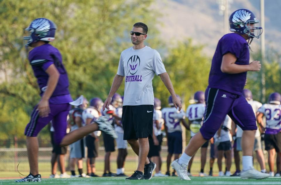 Cesar Chavez head coach William Chipley keeps an eye on his team during a practice at Cesar Chavez High School Sept, 15, 2021.