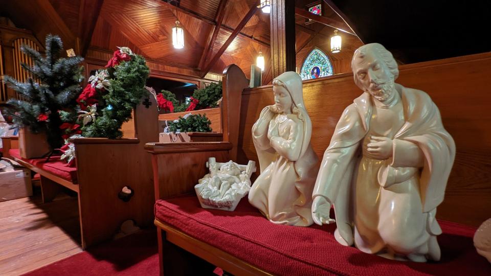 Nativity figures and oversized Christmas wreaths inside the sanctuary of Trinity Lutheran Church wait to be sold during the auction on Oct. 1.