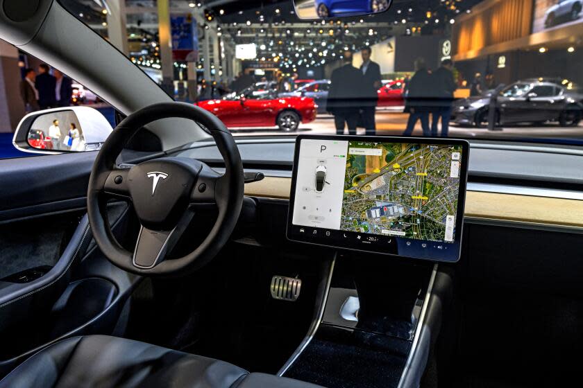 BRUSSELS, BELGIUM - JANUARY 09: Tesla Model 3 compact full electric car interior with a large touch screen on the dashboard on display at Brussels Expo on January 9, 2020 in Brussels, Belgium. The Model 3 is fitted with a full self-driving system. (Photo by Sjoerd van der Wal/Getty Images)