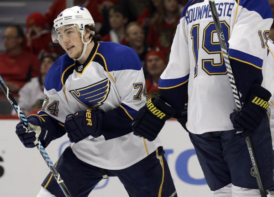 St. Louis Blues' T.J. Oshie (74) skates to the bench after scoring his goal during the first period in Game 6 of a first-round NHL hockey playoff series against the Chicago Blackhawks in Chicago, Sunday, April 27, 2014. (AP Photo/Nam Y. Huh)