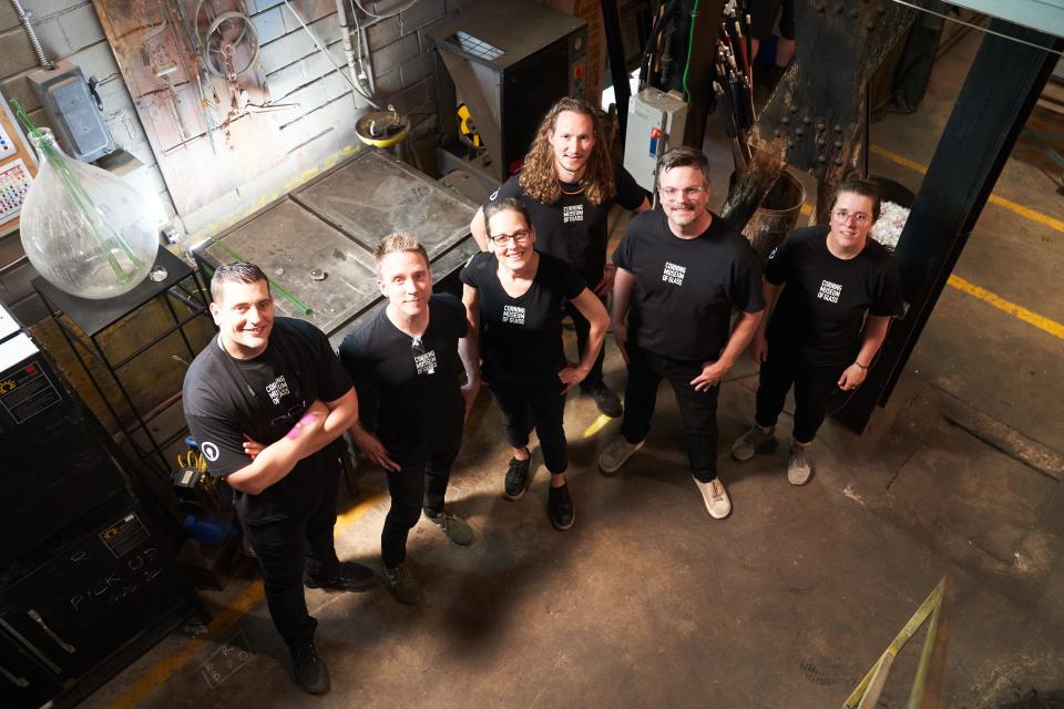 The Corning Museum of Glass Hot Glass Team on the set of Blown Away Season 4. The Season 4 Residency at CMoG is scheduled for April 22-26. Live audiences are invited to watch the winning artist at work in the Amphitheater Hot Shop with the support of the Hot Glass Team.