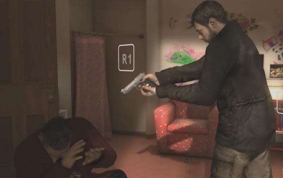 Ethan Mars aims a gun at the head of an innocent man in one of Heavy Rain's most disturbing scenes (Sony Computer Entertainment)