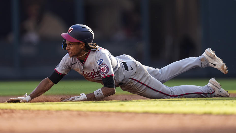 Washington Nationals' CJ Abrams steals second base in the eighth inning of a baseball game against the Atlanta Braves, Sunday, Oct. 1, 2023, in Atlanta. (AP Photo/John Bazemore)