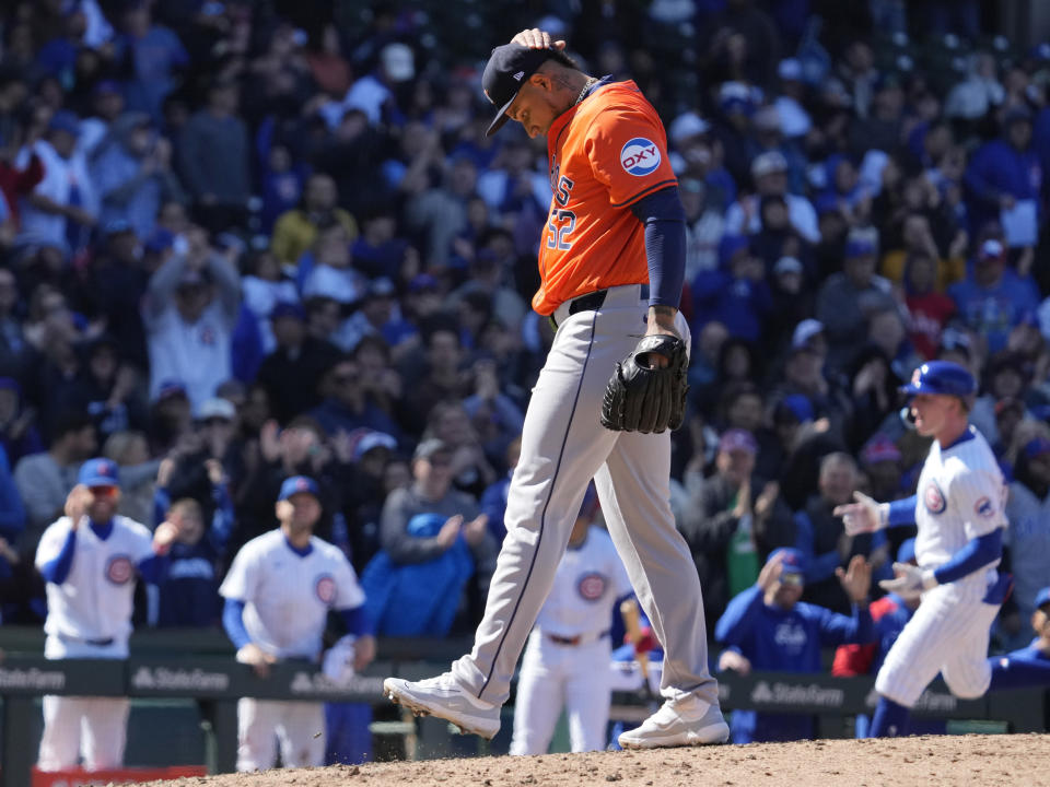 Houston Astros relief pitcher Bryan Abreu reacts after Chicago Cubs' Pete Crow-Armstrong hit a two-run home run during the sixth inning of a baseball game in Chicago, Thursday, April 25, 2024. (AP Photo/Nam Y. Huh)