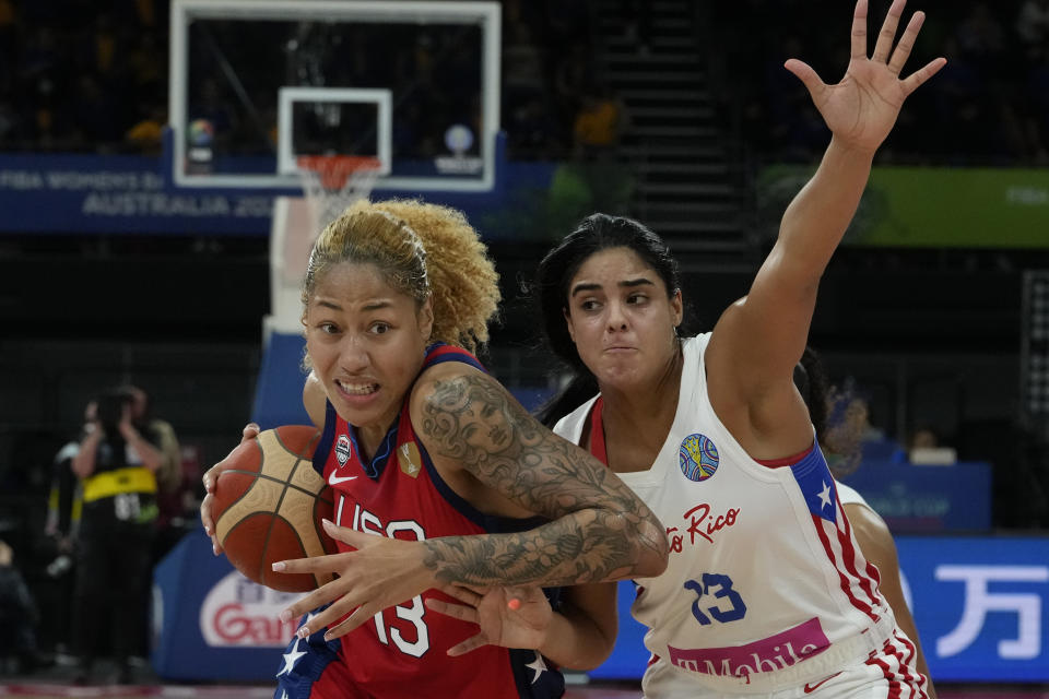 United States' Shakira Austin keeps the ball away from Puerto Rico's Nairimar Vargas at the women's Basketball World Cup in Sydney, Australia, Friday, Sept. 23, 2022. (AP Photo/Mark Baker)