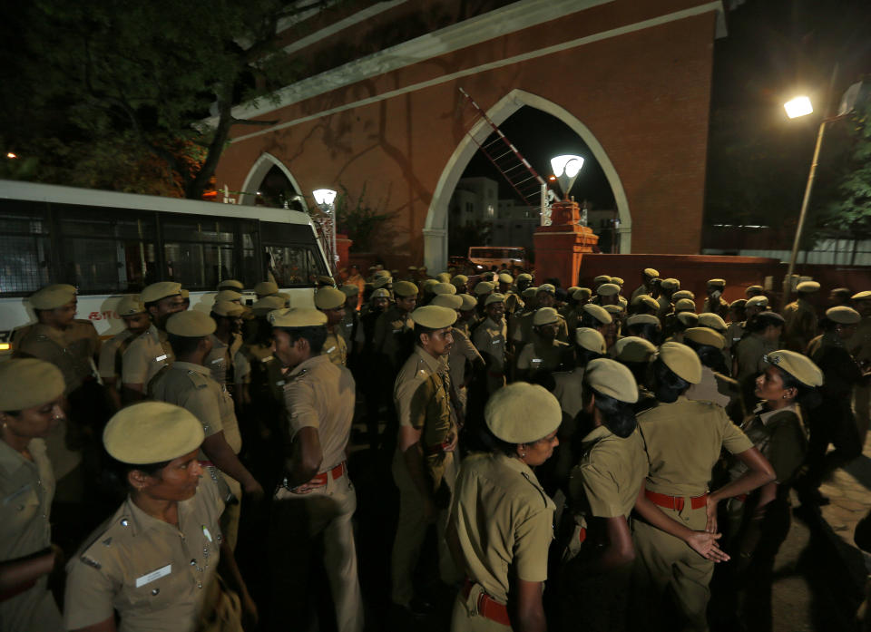 Police stand guard inside the high court premises in Chennai, India, July 17. Source: Reuters