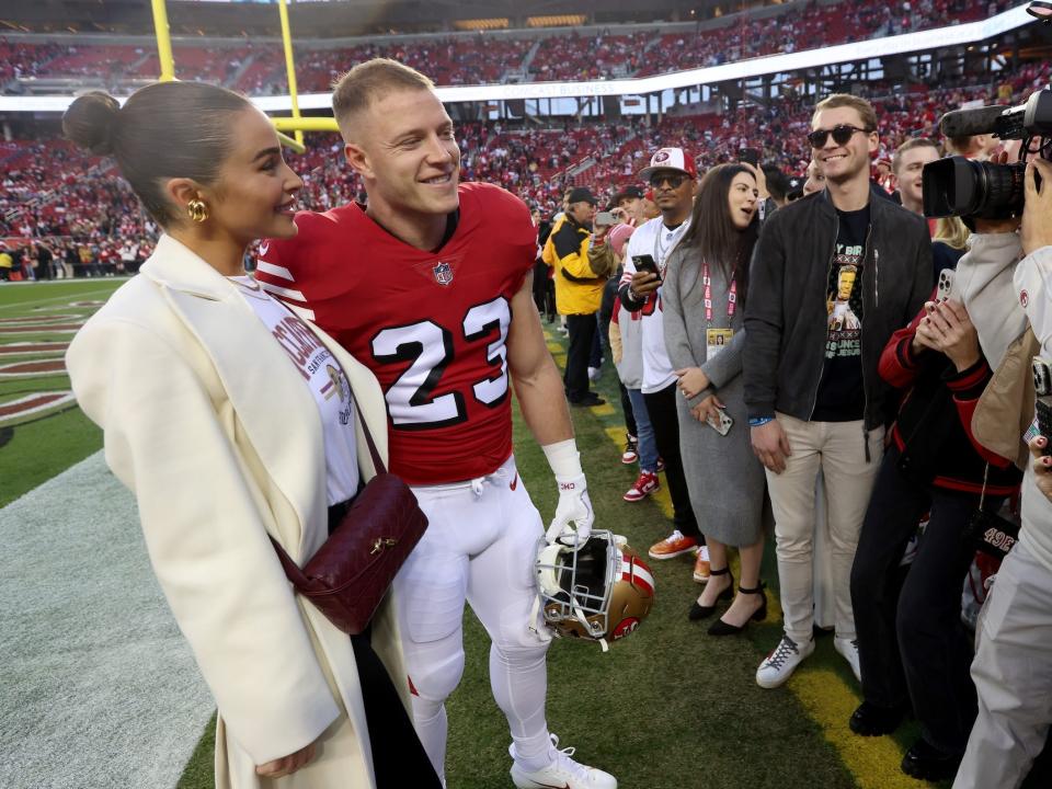 Christian McCaffrey and Olivia Culpo