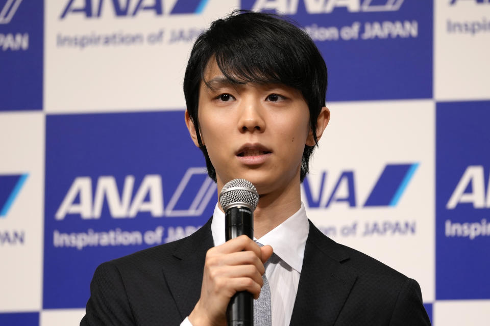 Two-time Olympic champion Yuzuru Hanyu of Japan, speaks during a press conference in Tokyo, Tuesday, July 19, 2022. Hanyu is stepping away from competitive figure skating, he said Tuesday. (AP Photo/Shuji Kajiyama)