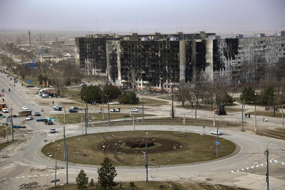 FILE - Damage is seen on apartment buildings after shelling from fighting on the outskirts of Mariupol, Ukraine, in territory under control of the separatist government of the Donetsk People's Republic, on Tuesday, March 29, 2022. (AP Photo/Alexei Alexandrov, File)