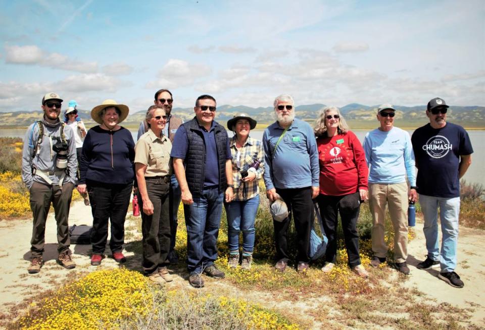 Central Coast Congressman Salud Carbajal, D-Santa Barbara, poses (center) with members of the Los Padres ForestWatch, Santa Lucia Chapter of the Sierra Club, Carrizo Plain Conservancy, U.S. Bureau of Land Management, California Wilderness Coalition and Santa Ynez Band of Chumash Indians at the Carrizo Plain National Monument on April 8, 2023. Mackenzie Shuman/mshuman@thetribunenews.com