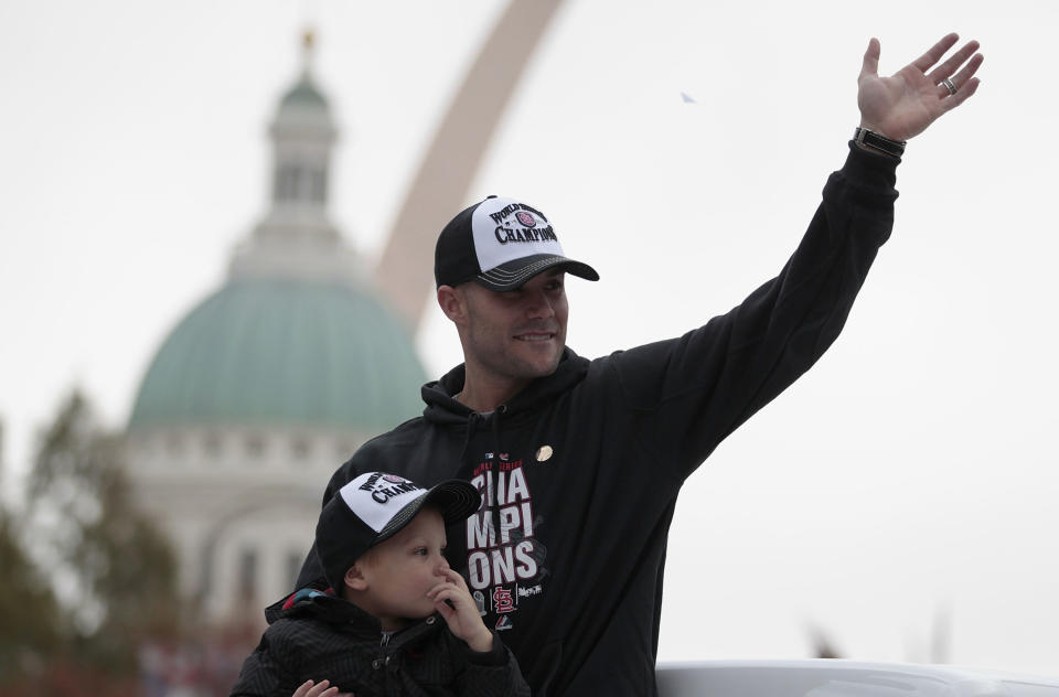 ST. LOUIS, MO - OCTOBER 30: Skip Schumaker of the St. Louis Cardinals participates in a parade celebrating the team's 11th World Series championship October 30, 2011 in St. Louis, Missouri. (Photo by Whitney Curtis/Getty Images)