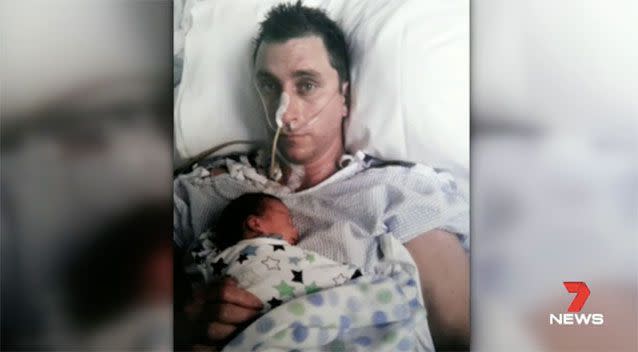 Ben Hammond with his infant son James in 2012. Source: 7 News