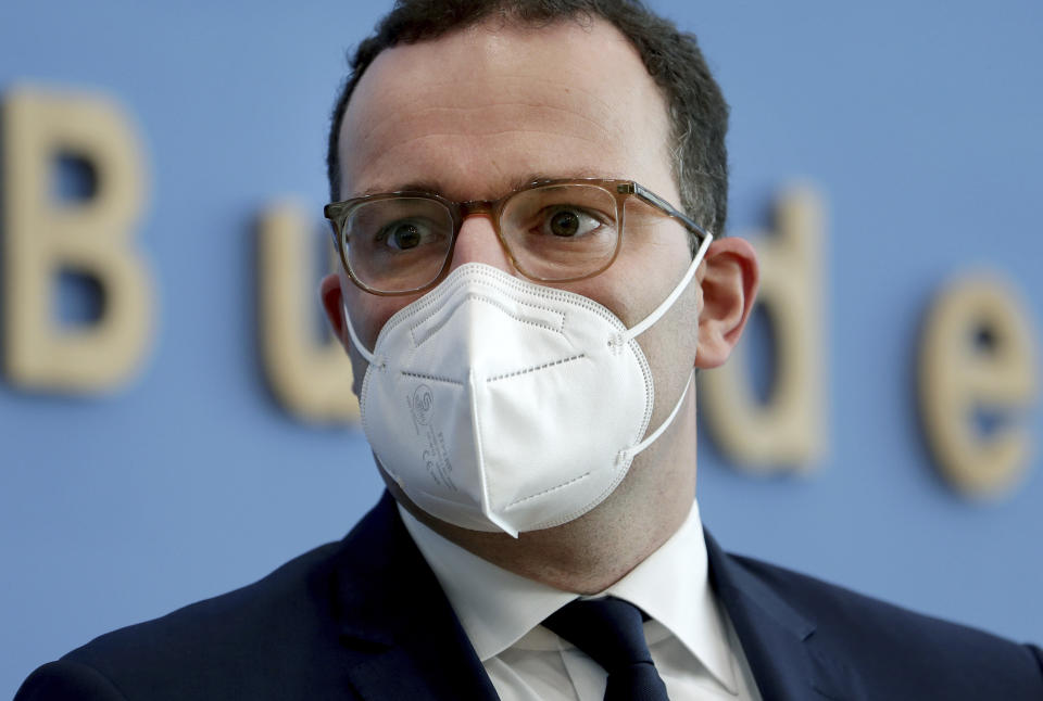 FILE - In this Tuesday, Nov. 3, 2020 file photo, German Health Minister Jens Spahn arrives for a press conference in Berlin, Germany. The coronavirus pandemic is colliding with politics as Germany embarks on its vaccination drive and one of the most unpredictable election years in its post-World War II history. (AP Photo/Michael Sohn, file, pool)