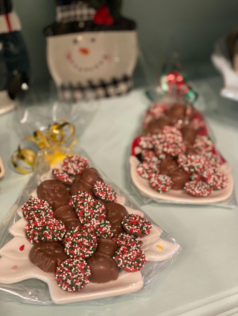 Assorted homemade chocolate on seasonal Christmas trays from Sweet Revenge Custom Chocolate in Point Pleasant Beach.