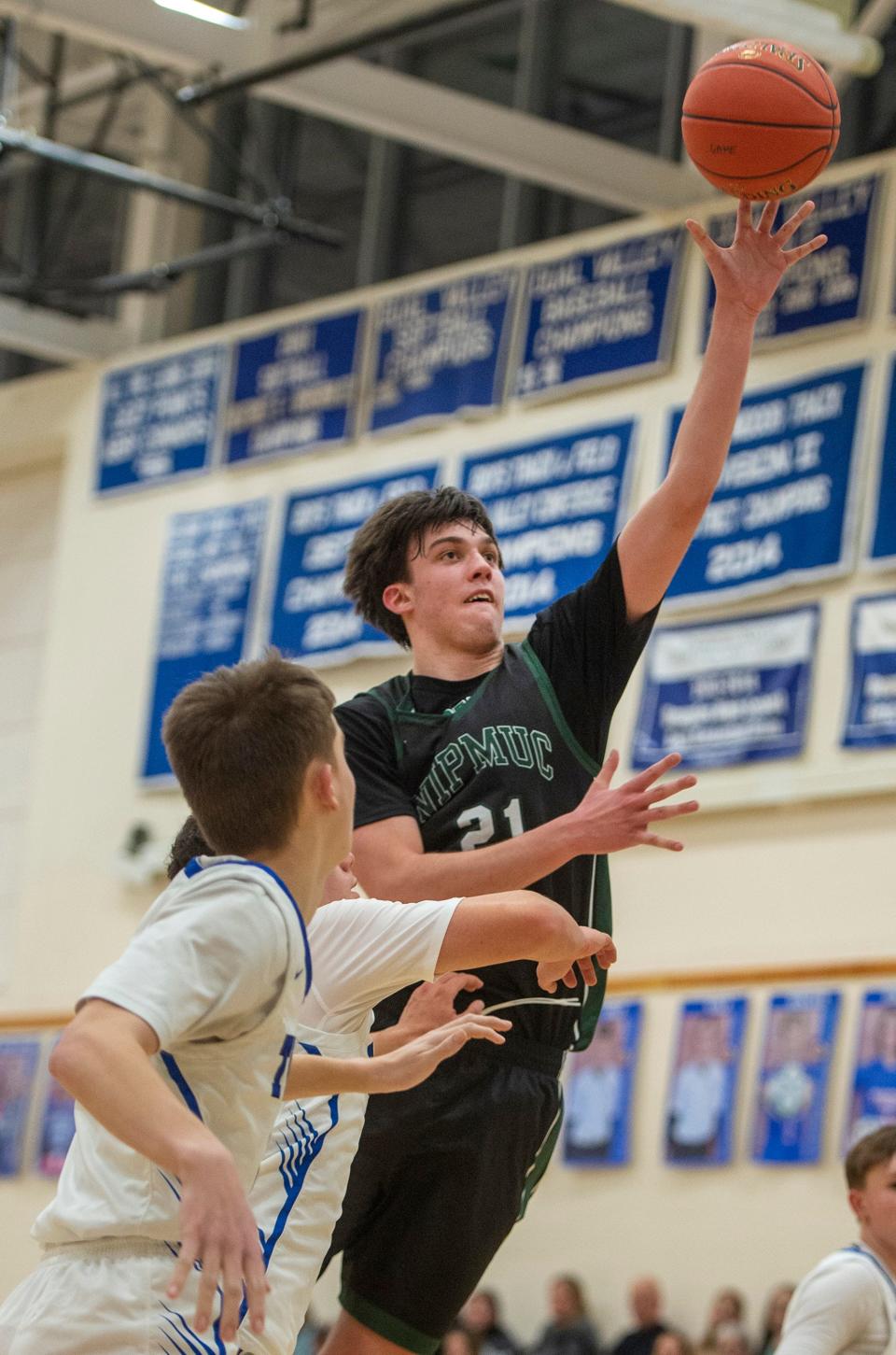 Nipmuc High School's James McKinney goes up for two points against Douglas, Jan. 3, 2024.