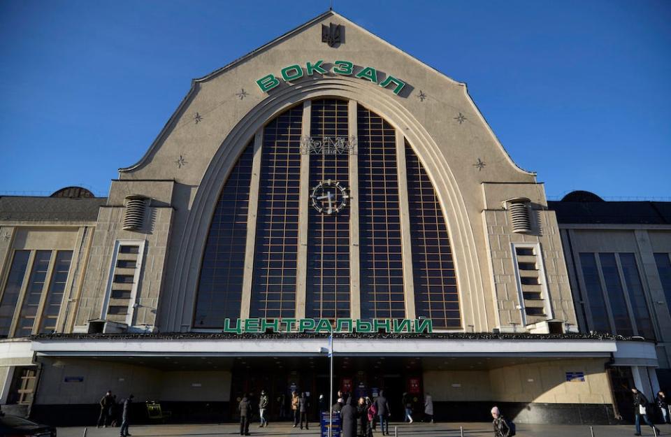 A front view of the exterior of Kyiv railway station against a clear blue sky on February 23, 2022 in Kyiv, Ukraine.