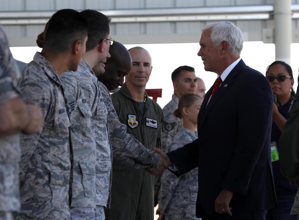 Vice President Mike Pence meets airmen on the flight line during a visit to Nellis Air Force Base in Las Vegas, Friday, Sept. 7, 2018. (Steve Marcus/Las Vegas Sun via AP)