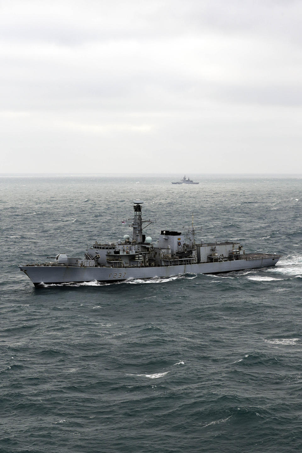 The Royal Navy warship HMS Westminster (foreground) with the Russian frigate Boiky as it escorts four Russian vessels through the English Channel (Picture: PA)