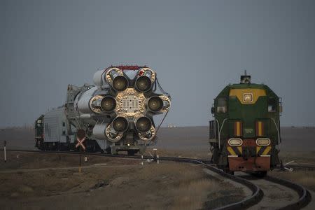 The Proton rocket, that will launch the ExoMars 2016 spacecraft to Mars, is transfered to the launchpad at the Baikonur cosmodrome, Kazakhstan, in this handout photo released by European Space Agency (ESA) on March 11, 2016. REUTERS/Stephane Corvaja/ESA/Handout via Reuters