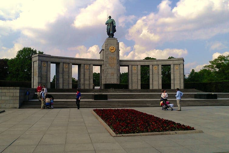 <span class="caption">Soviet war memorial in the Tiergarten, Berlin, erected in 1945.</span> <span class="attribution"><a class="link " href="https://en.wikipedia.org/wiki/Soviet_War_Memorial_(Tiergarten)#/media/File:Soviet_War_Memorial_in_Tiergarten,_April_2014.jpg" rel="nofollow noopener" target="_blank" data-ylk="slk:Ethan Doyle White via Wikimeda Commons;elm:context_link;itc:0;sec:content-canvas">Ethan Doyle White via Wikimeda Commons</a>, <a class="link " href="http://creativecommons.org/licenses/by/4.0/" rel="nofollow noopener" target="_blank" data-ylk="slk:CC BY;elm:context_link;itc:0;sec:content-canvas">CC BY</a></span>